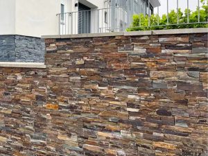 حجر حائط رمادي فضفاض – تصميم أنيق وخالد لأي مساحة