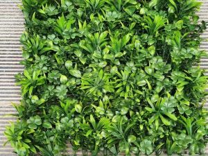 ألواح تغطية الجدران باللون الأخضر - ديكور الحديقة بالعشب الصناعي البلاستيكي ونباتات الزهور